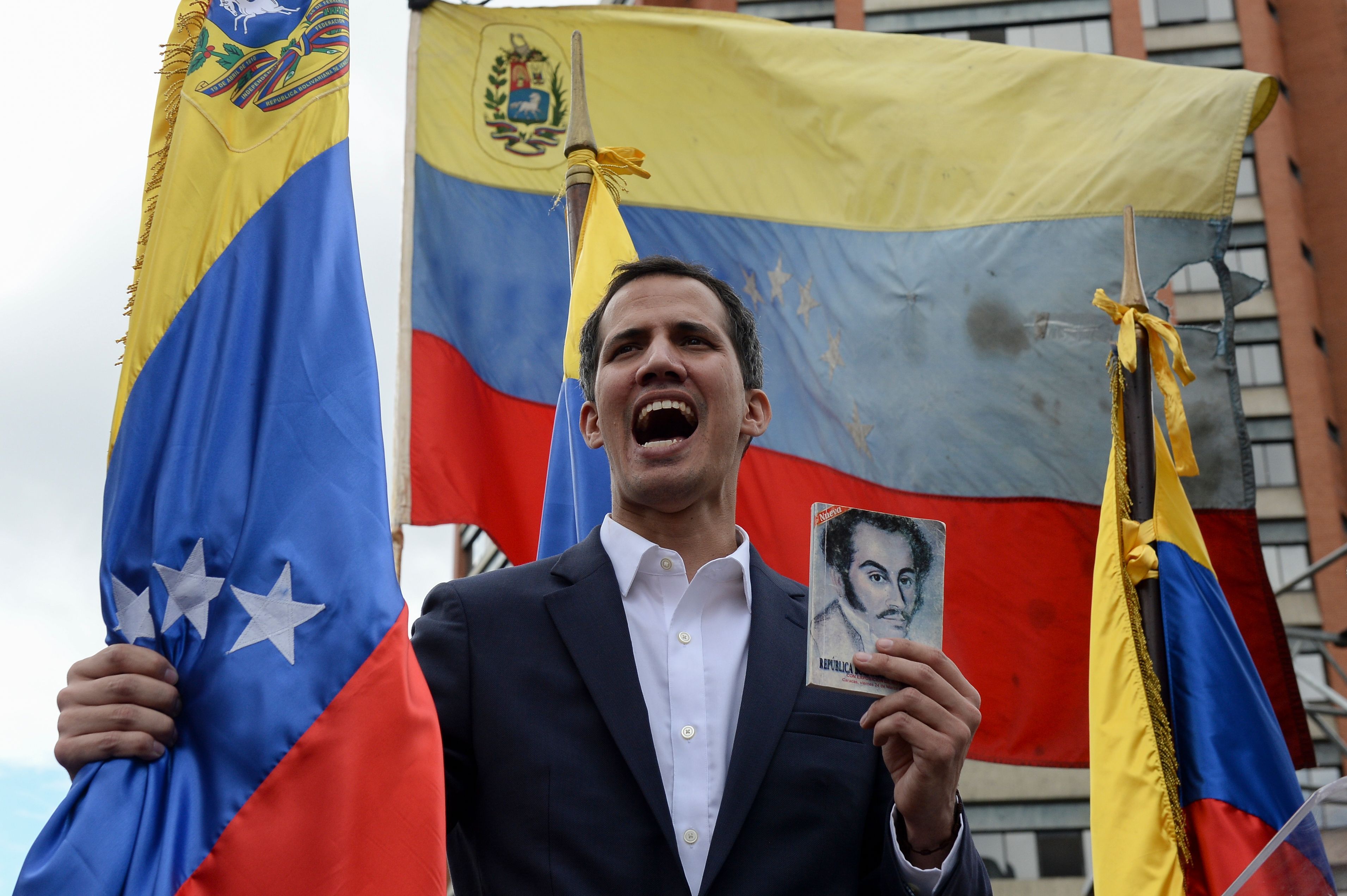 National Assembly head Juan Guaido declares himself the country's 'acting president' during a mass opposition rally against leader Nicolas Maduro.
