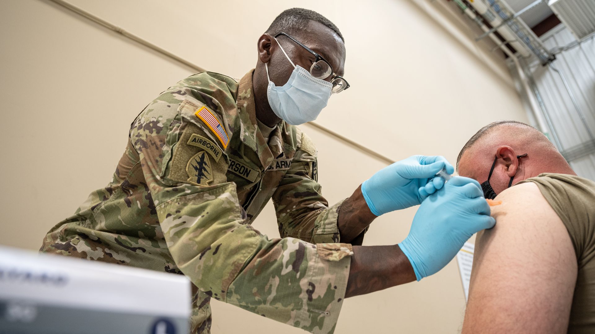 Preventative Medicine Services NCOIC Sergeant First Class Demetrius Roberson administers a COVID-19 vaccine to a soldier on September 9, 2021 in Fort Knox, Kentucky.