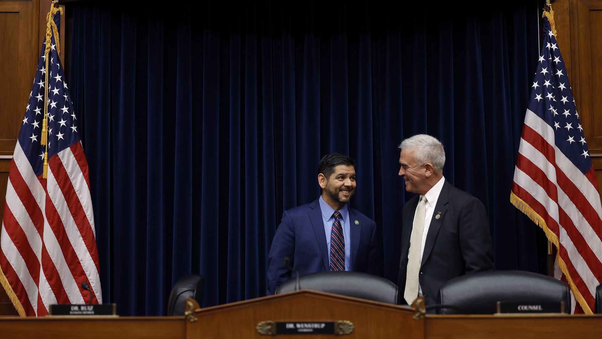 Raul Ruiz talks with Chairman Brad Wenstrup before a subcommittee hearing in the Rayburn House Office Building on Capitol Hill on March 8.