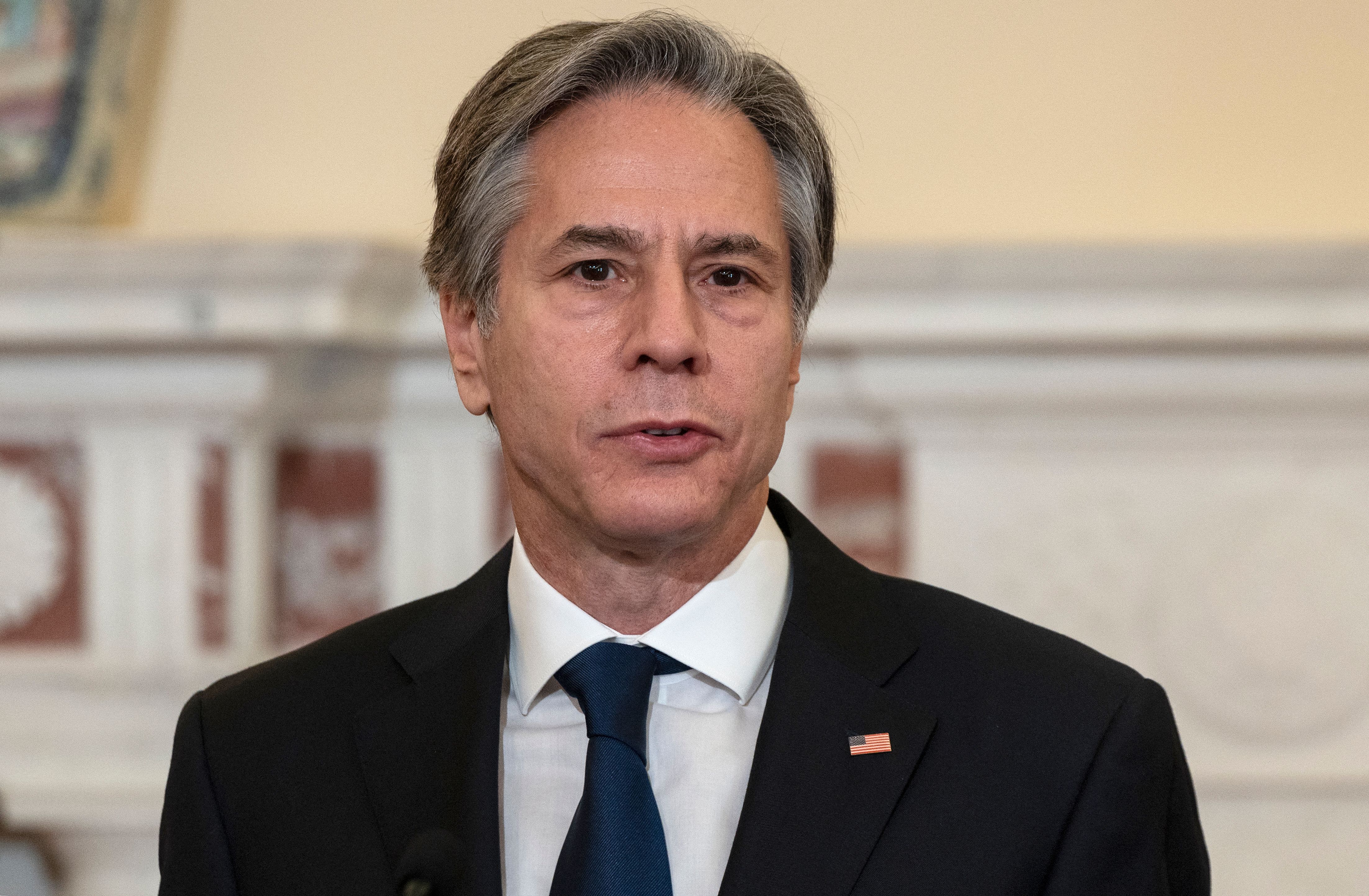 Former U.S. Secretary of State Antony Blinken stands at a podium delivering remarks on Havana syndrome in the State Department’s Benjamin Franklin Room in Washington, D.C., in November 2021.