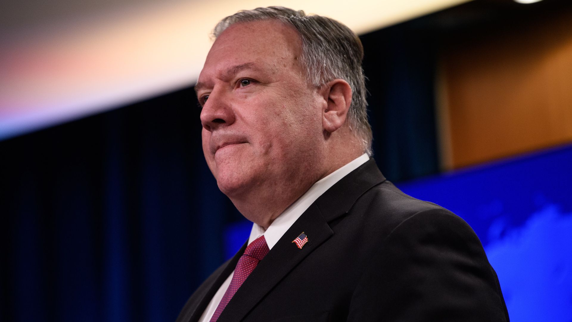 Mike Pompeo wears a suit