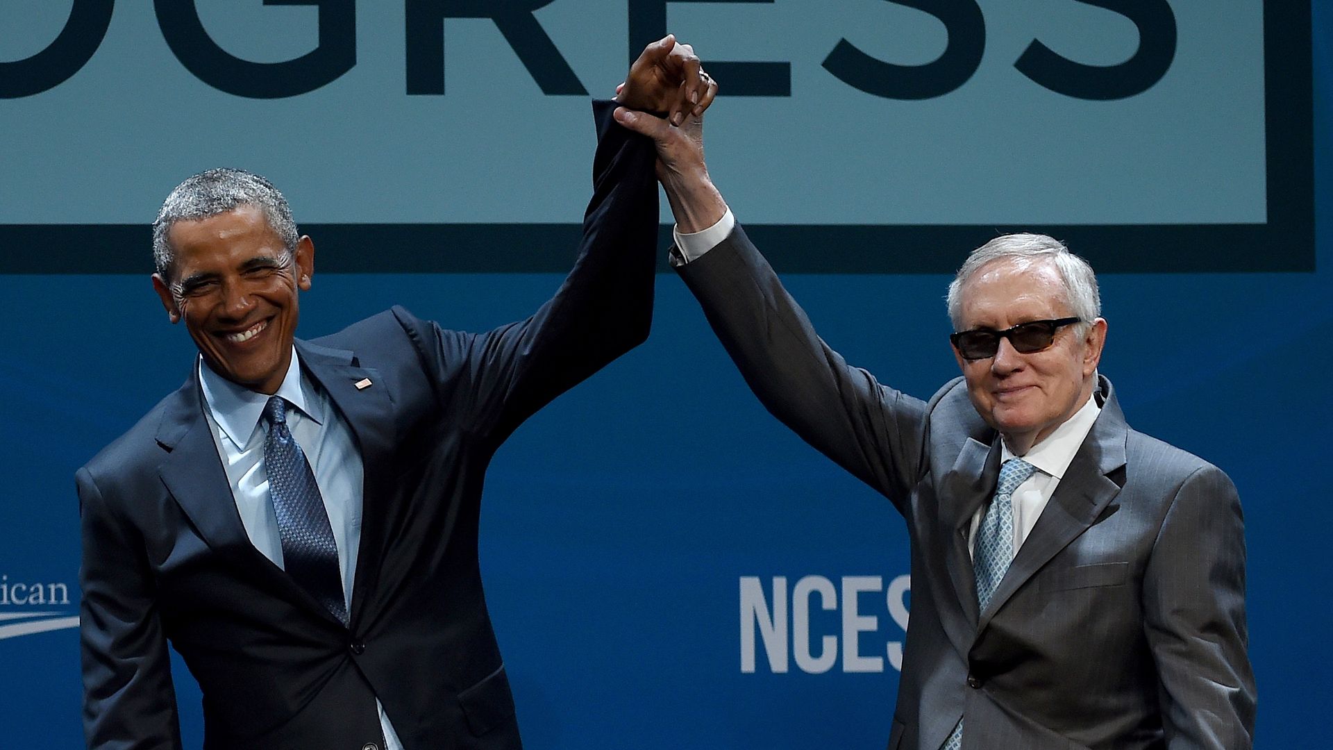 Then-President Barack Obama (L) and then-Senate Minority Leader Harry Reid (D-NV) on August 24, 2015 in Las Vegas, Nevada.