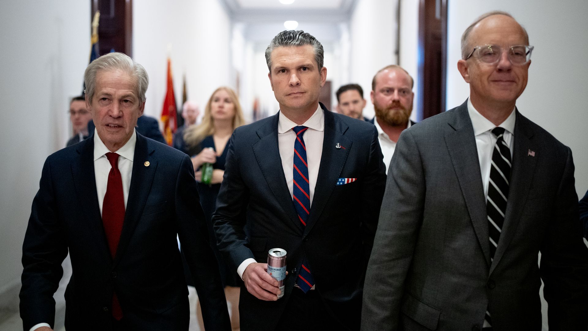 Pete Hegseth (C) leaves a meeting with Sen. Tommy Tuberville (R-AL) on Capitol Hill on December 2