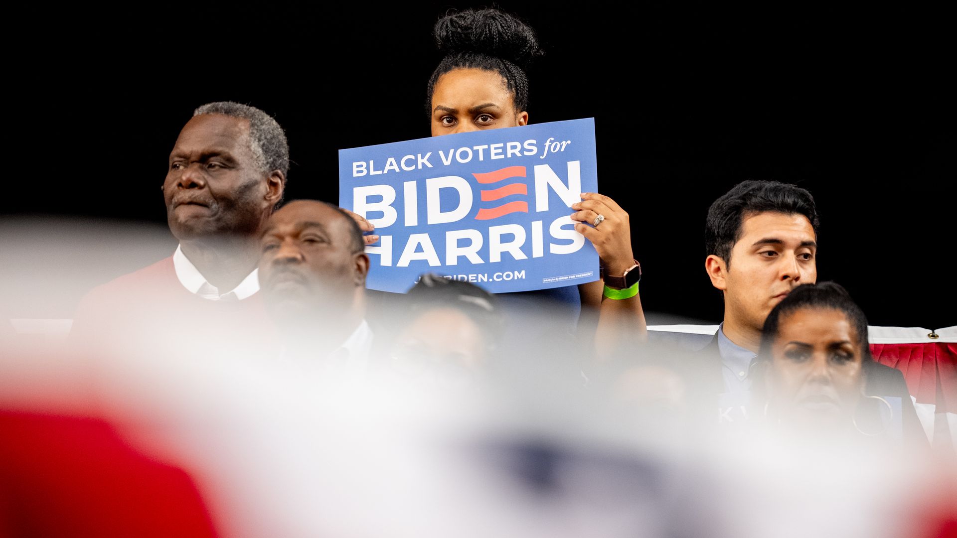 Members of the audience wait for the start of a campaign rally for U.S. President Joe Biden and U.S. Vice President Kamala Harris at Girard College on May 29, 2024 in Philadelphia, Pennsylvania. 