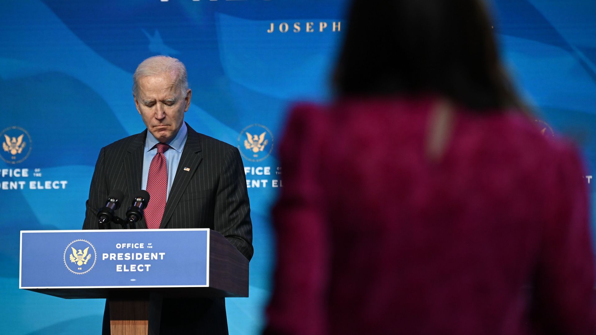 President-elect Biden is seen listening to a reporter's question in January in Wilmington, Delaware.