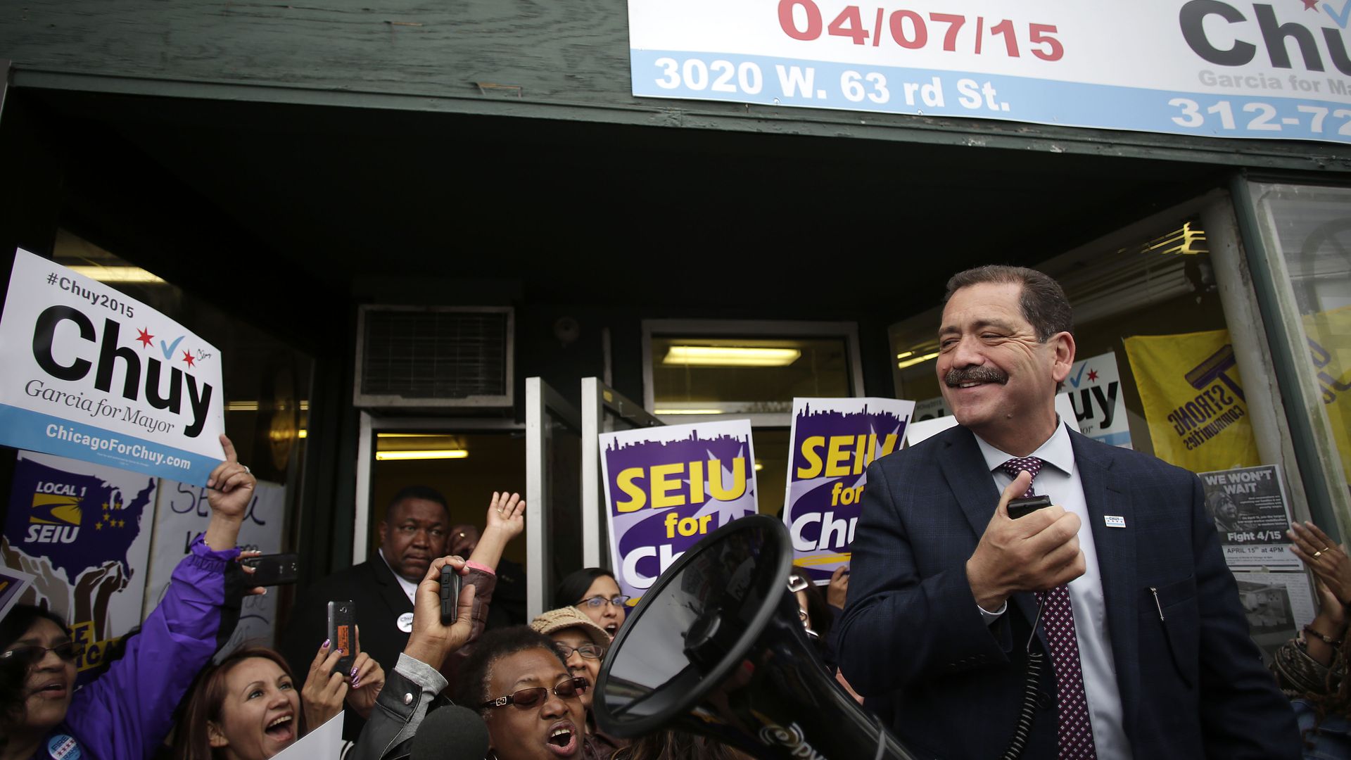 Candidate standing before crowd