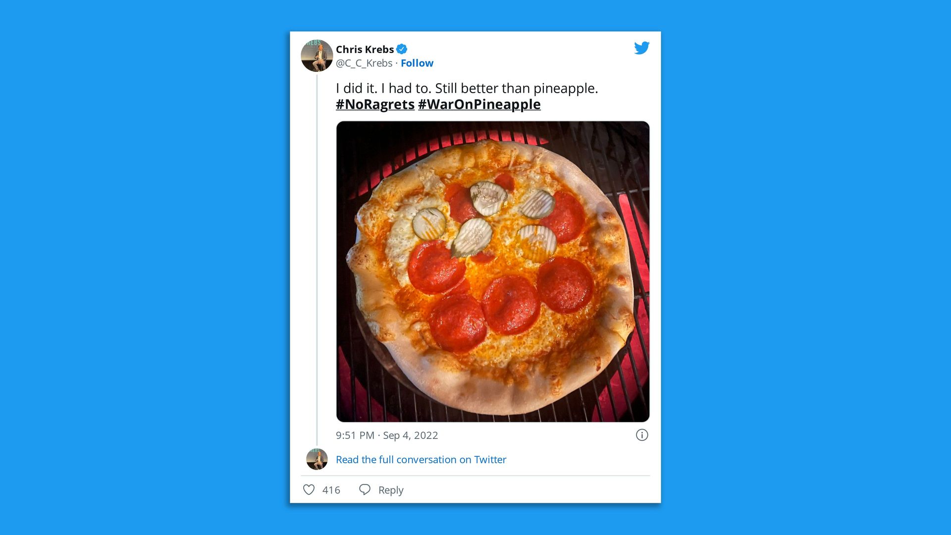 Screenshot of a Twitter from former CISA Director Chris Krebs with a photo of pickles on pizza