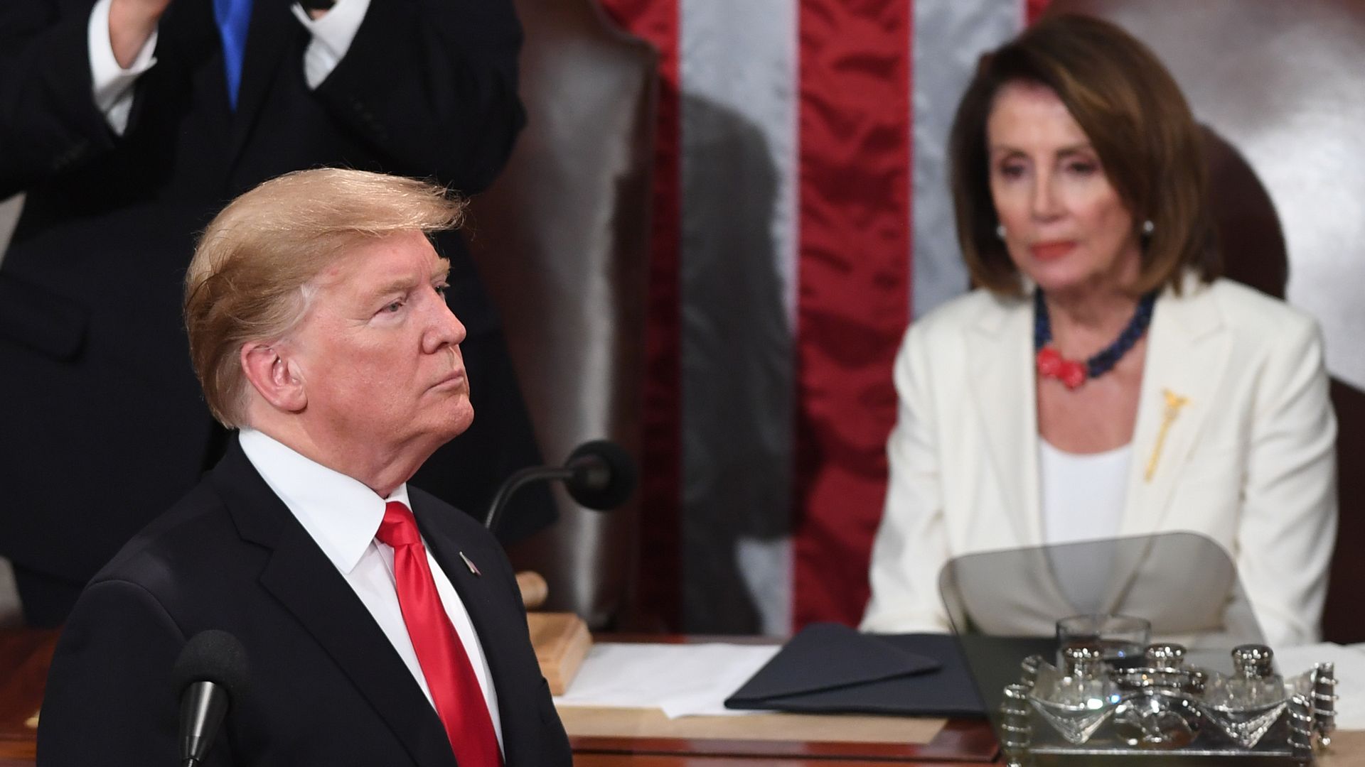 President Trump, flanked by Speaker of the US House of Representatives Nancy Pelosi, delivers the State of the Union address at the US Capitol in Washington, DC, on February 5, 2019. 
