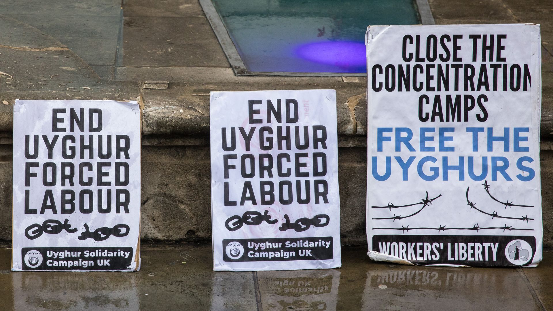 End Uyghur forced labor signs