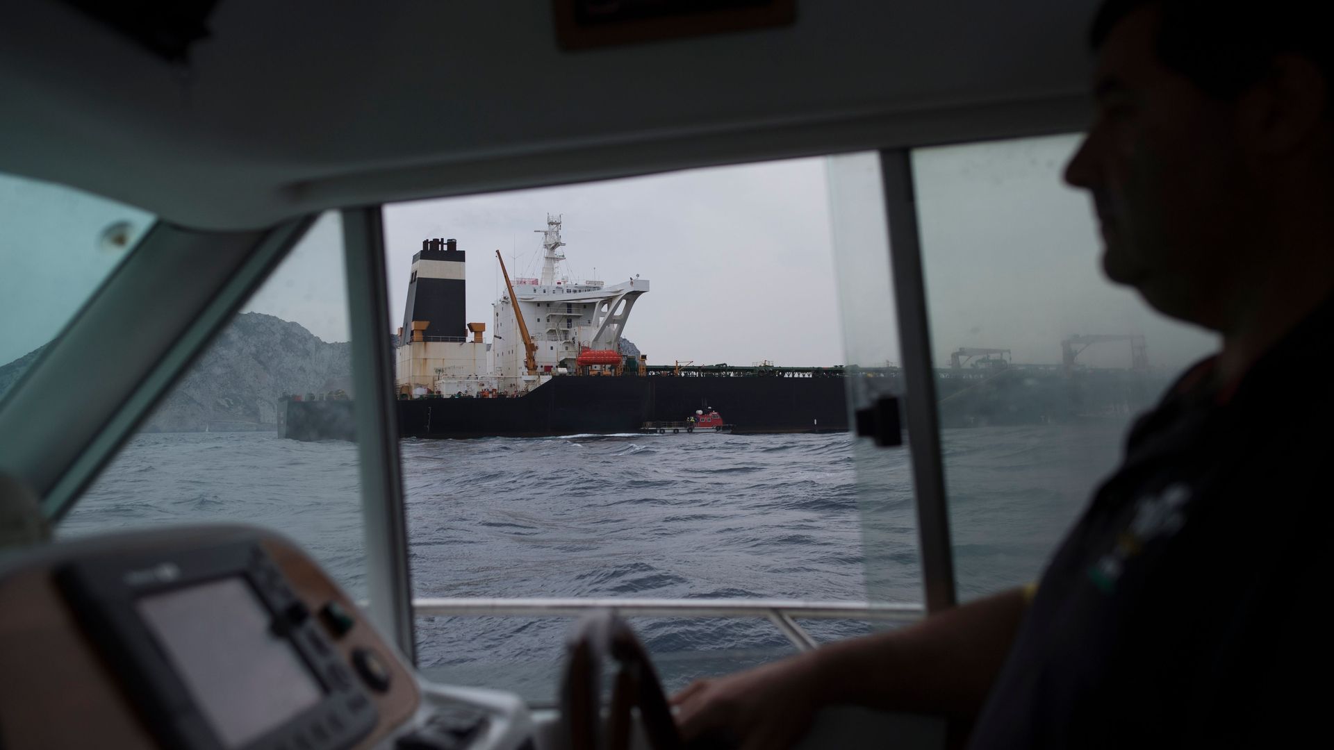 This image shows a boat through another boat's window