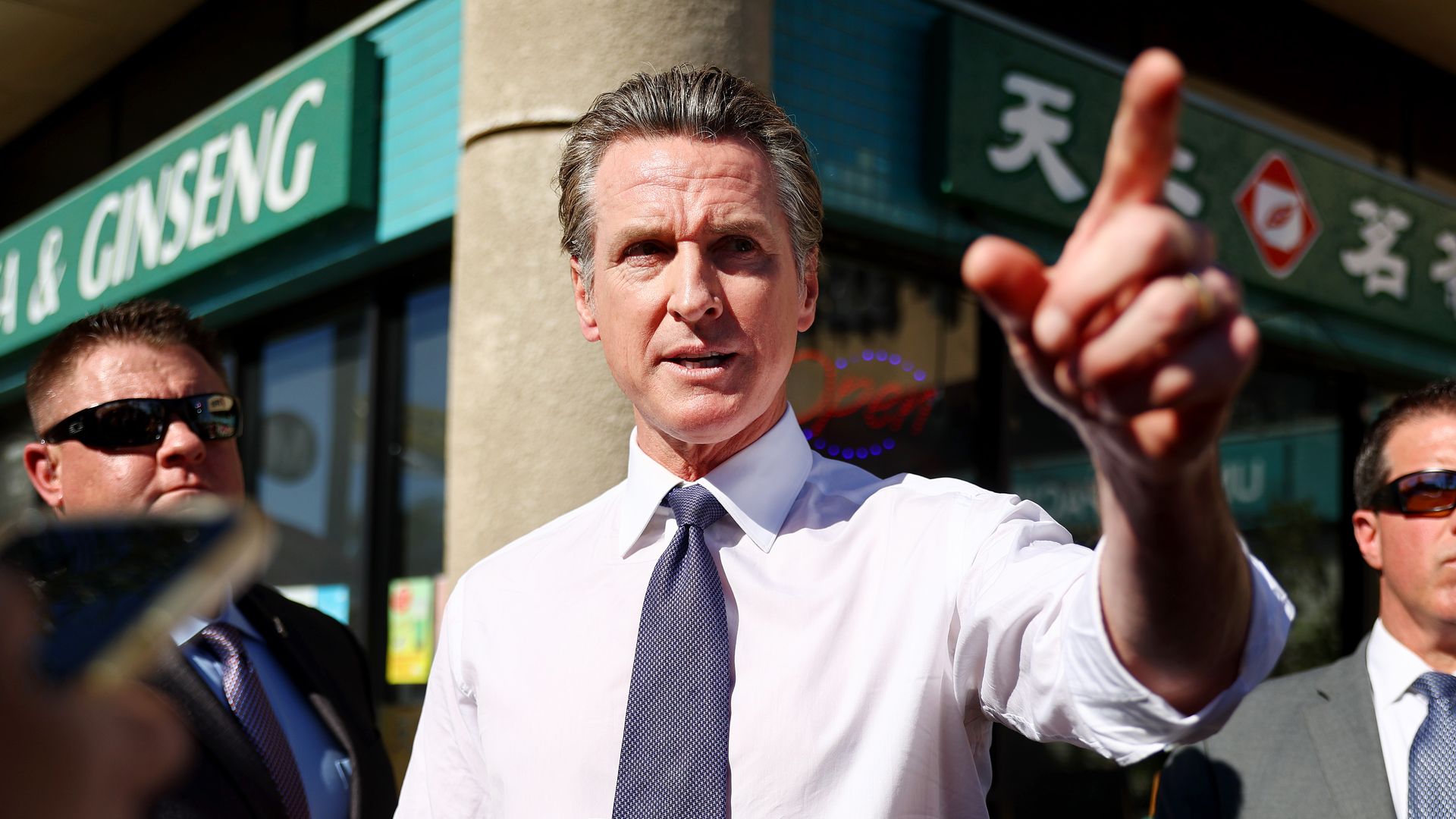 California governor talking and pointing finger.