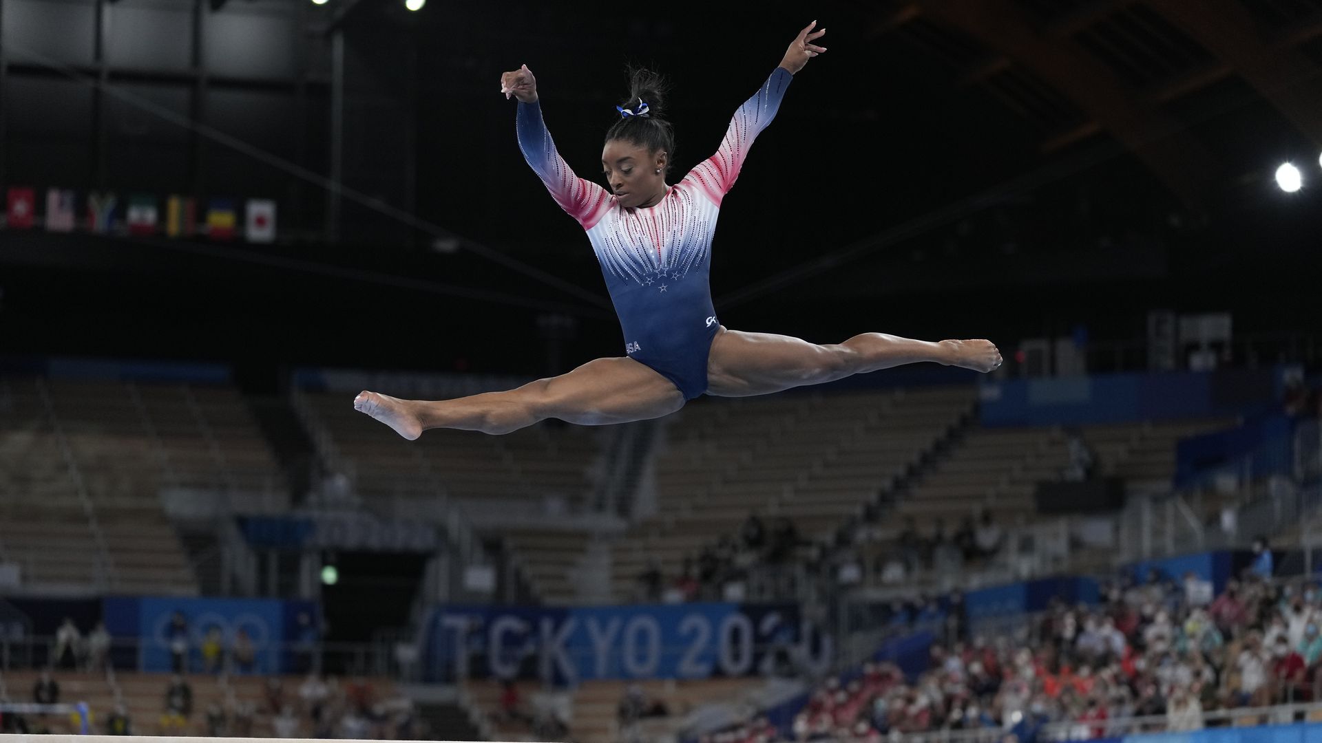 Simone Biles performs on the balance beam during the artistic gymnastics women's apparatus final at the 2020 Summer Olympics in Tokyo