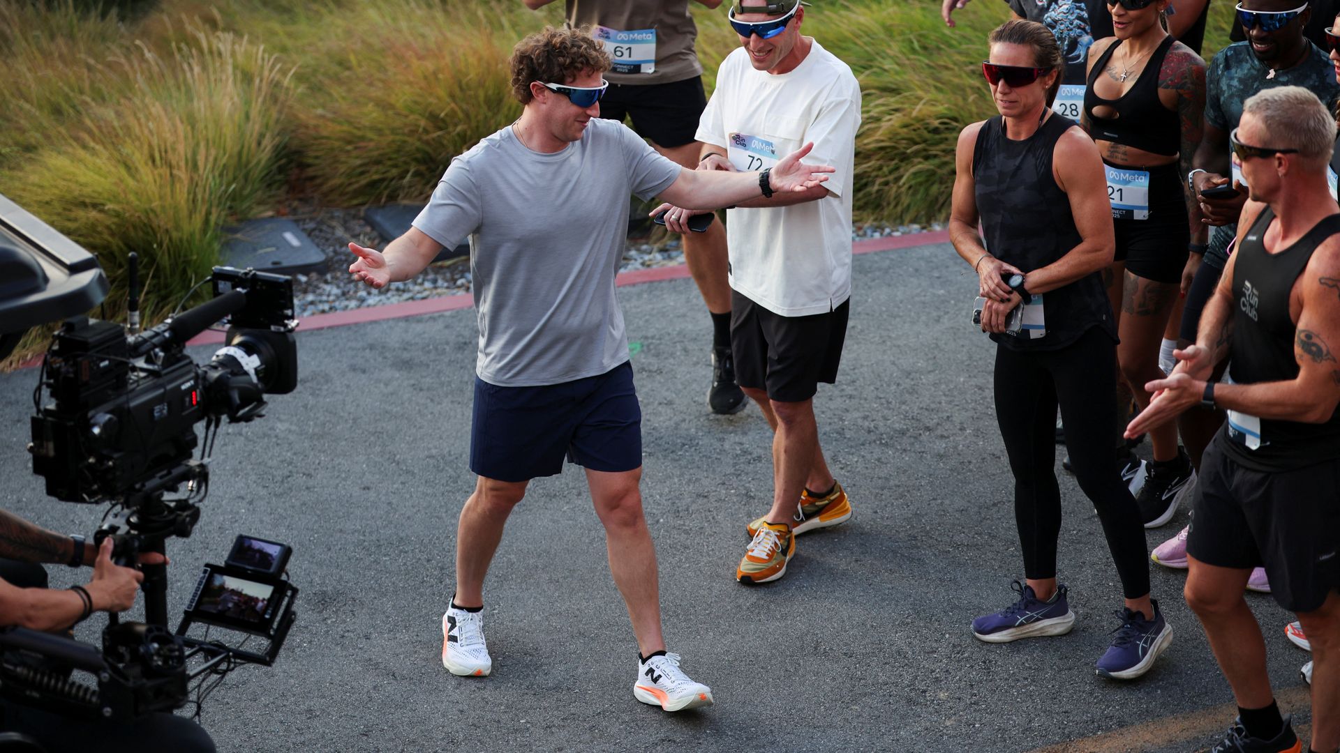 Meta CEO Mark Zuckerberg goes for a run wearing Oakley Meta Vanguard glasses at Meta Connect at company headquarters in Menlo Park, Calif., in September. Photo: Carlos Barria/Reuters