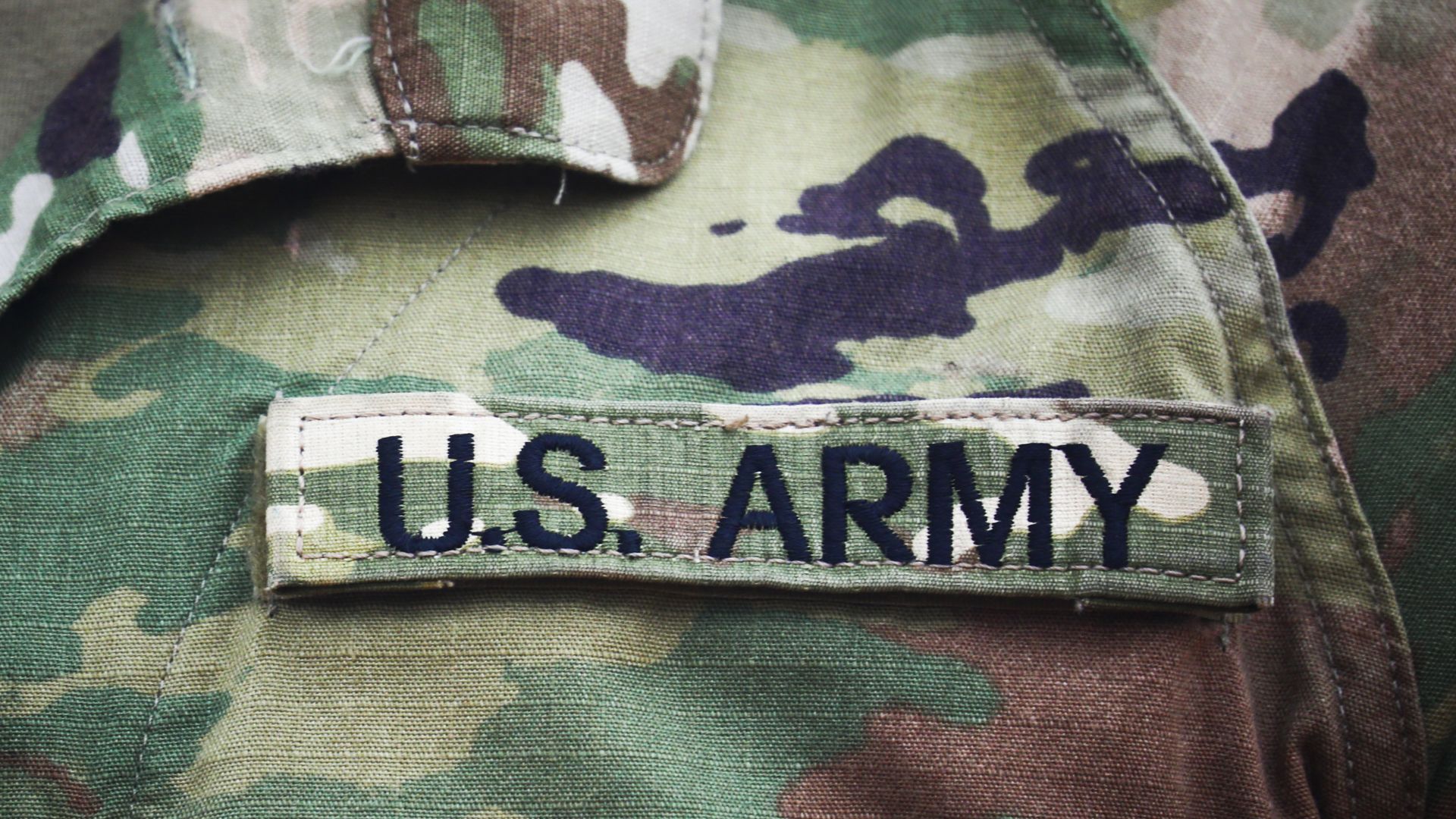 U.S Army badge is seen on a uniform of American soldier who attends a ceremony at the Kosciuszko Mound in Krakow, Poland, on August 4, 2020. 