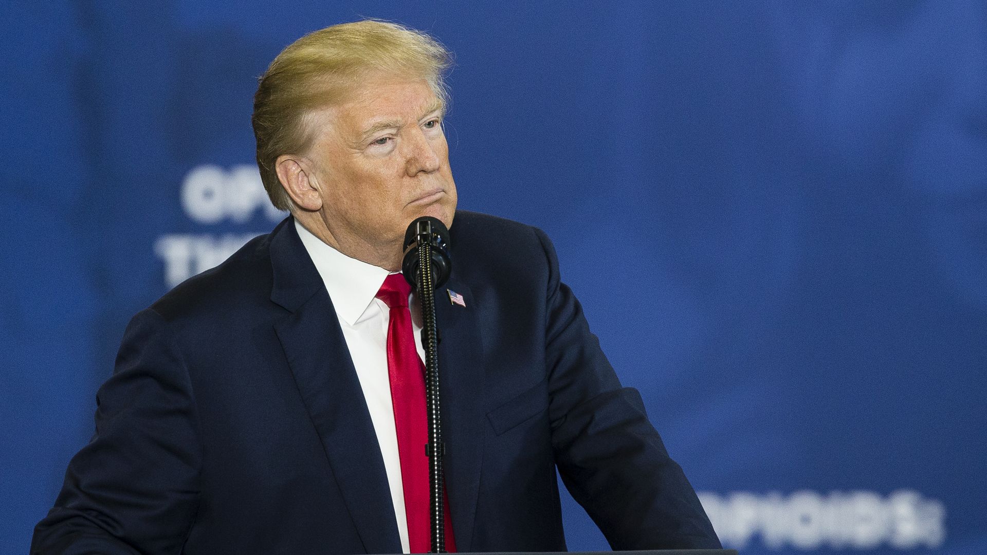 President Trump at a podium.