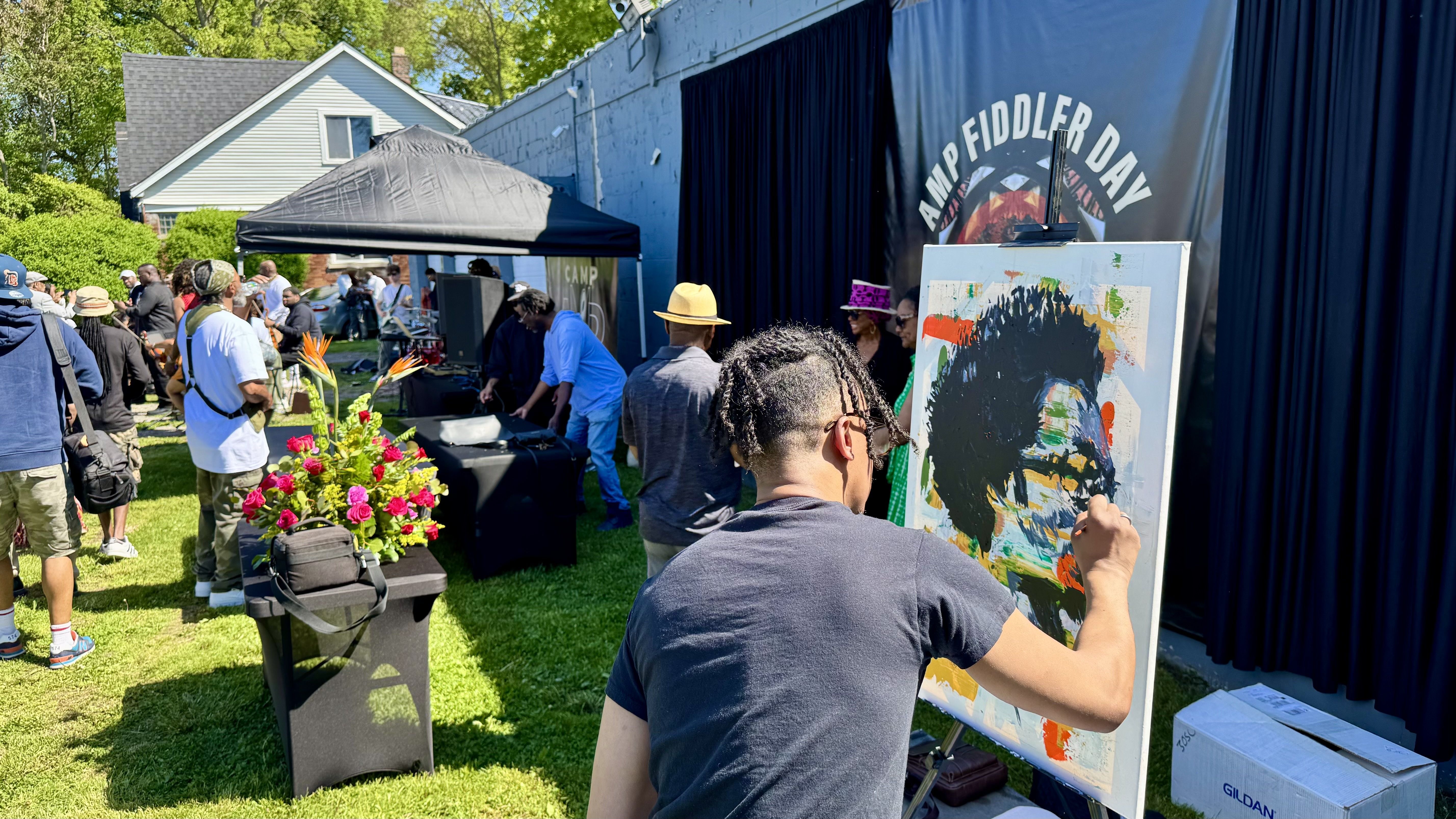 Artist paints during the event
