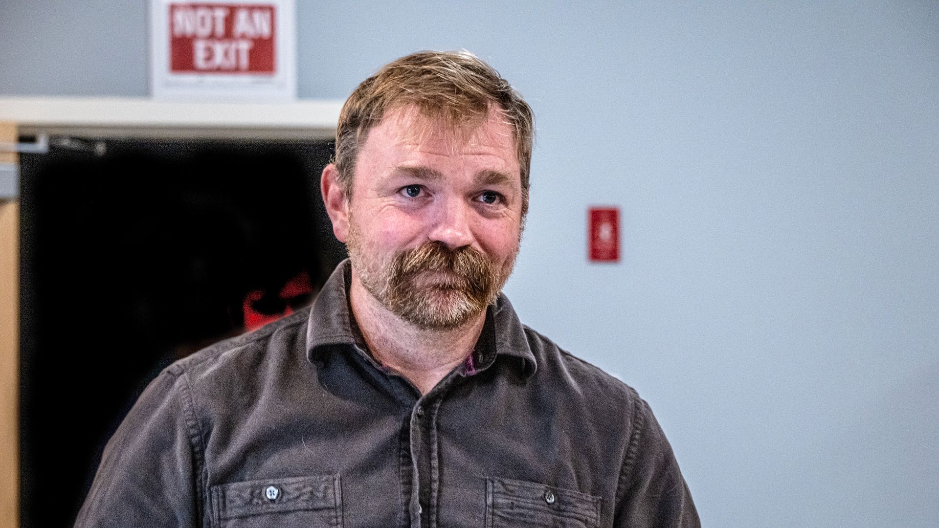 Democratic U.S. Senate candidate Graham Platner speaks to voters at a town hall on June 7 in Portland, Maine.