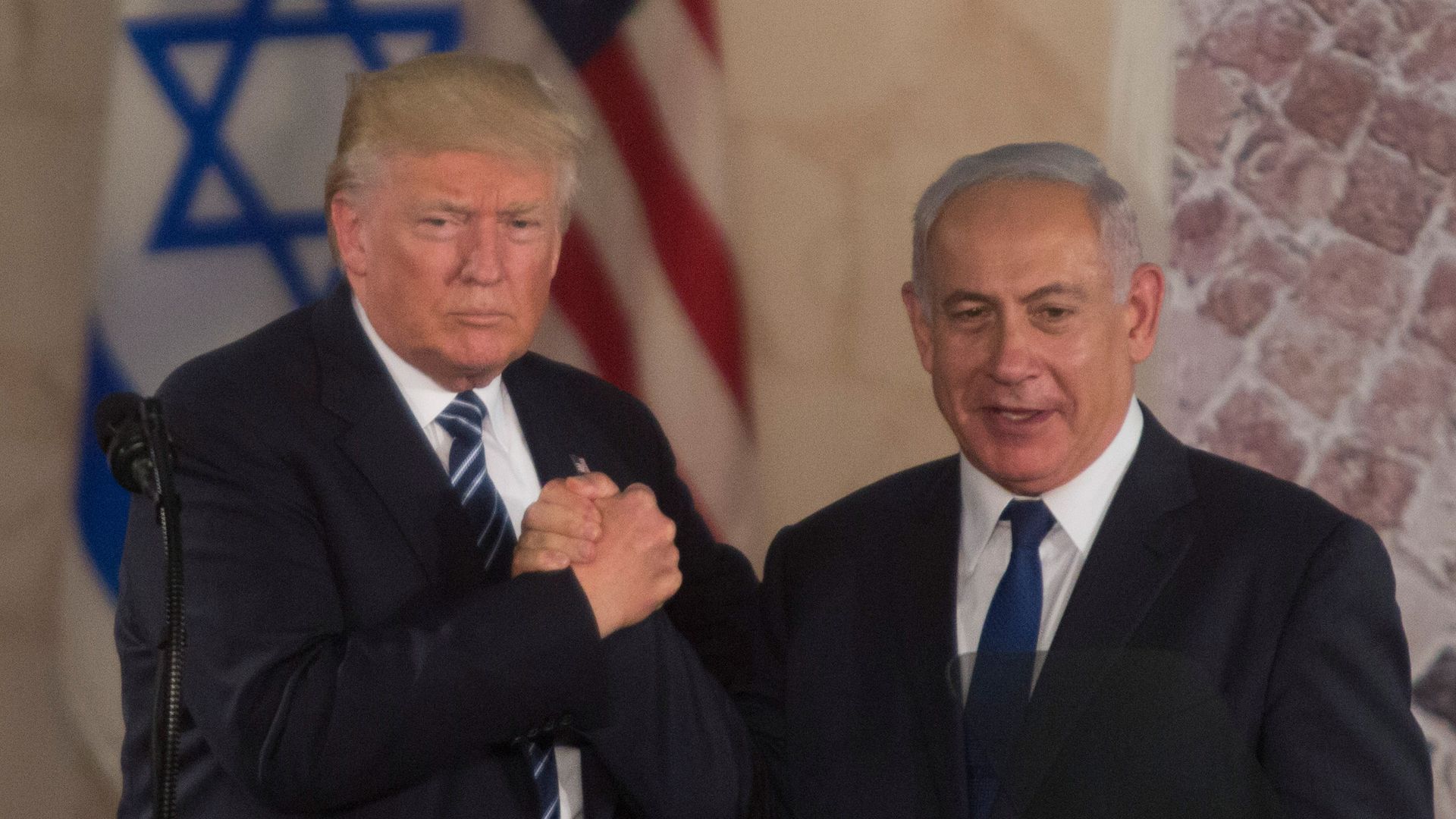 Trump shakes hands with Netanyahu
