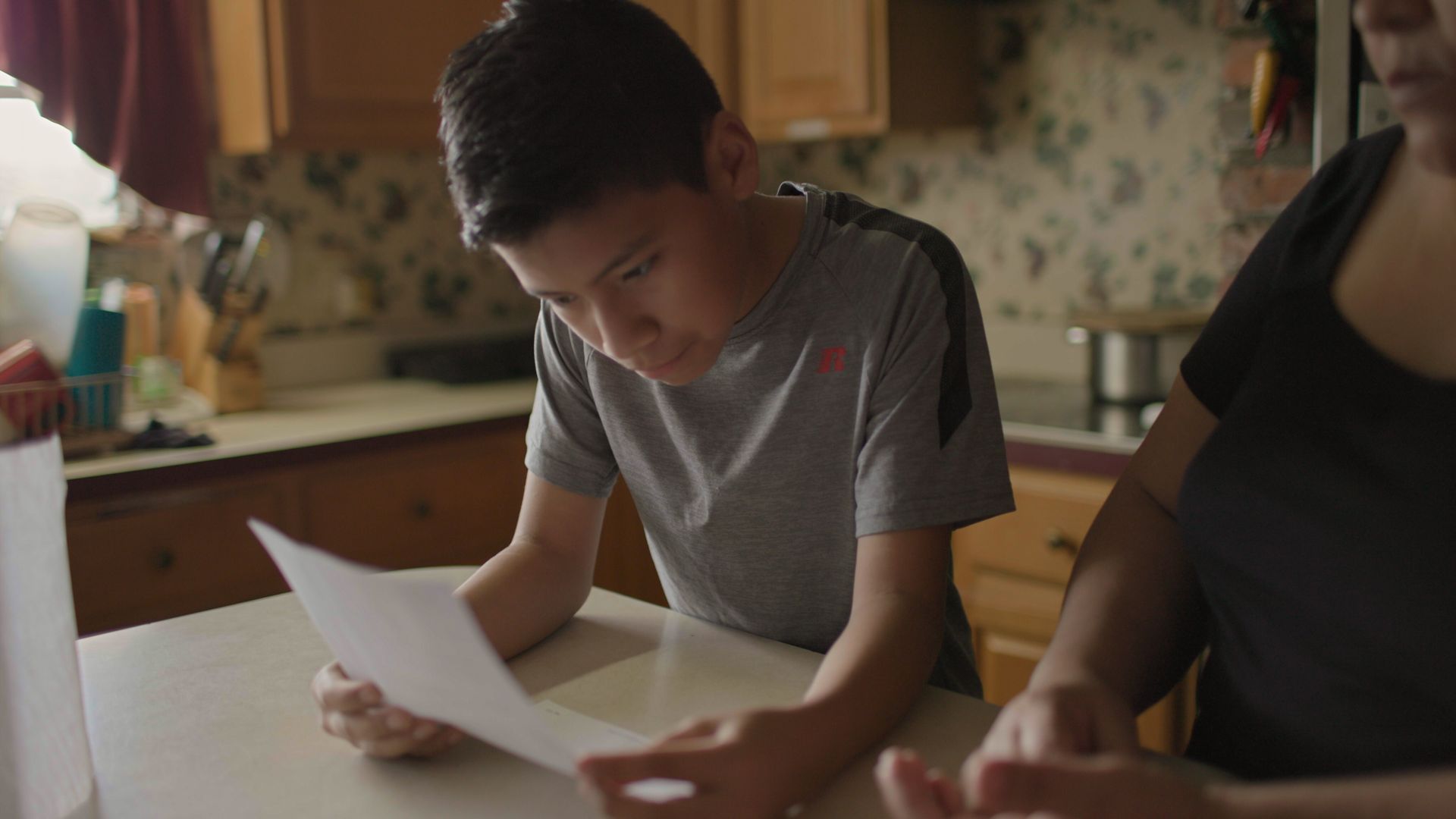 Densel, 11, one of three children featured in "Translators."