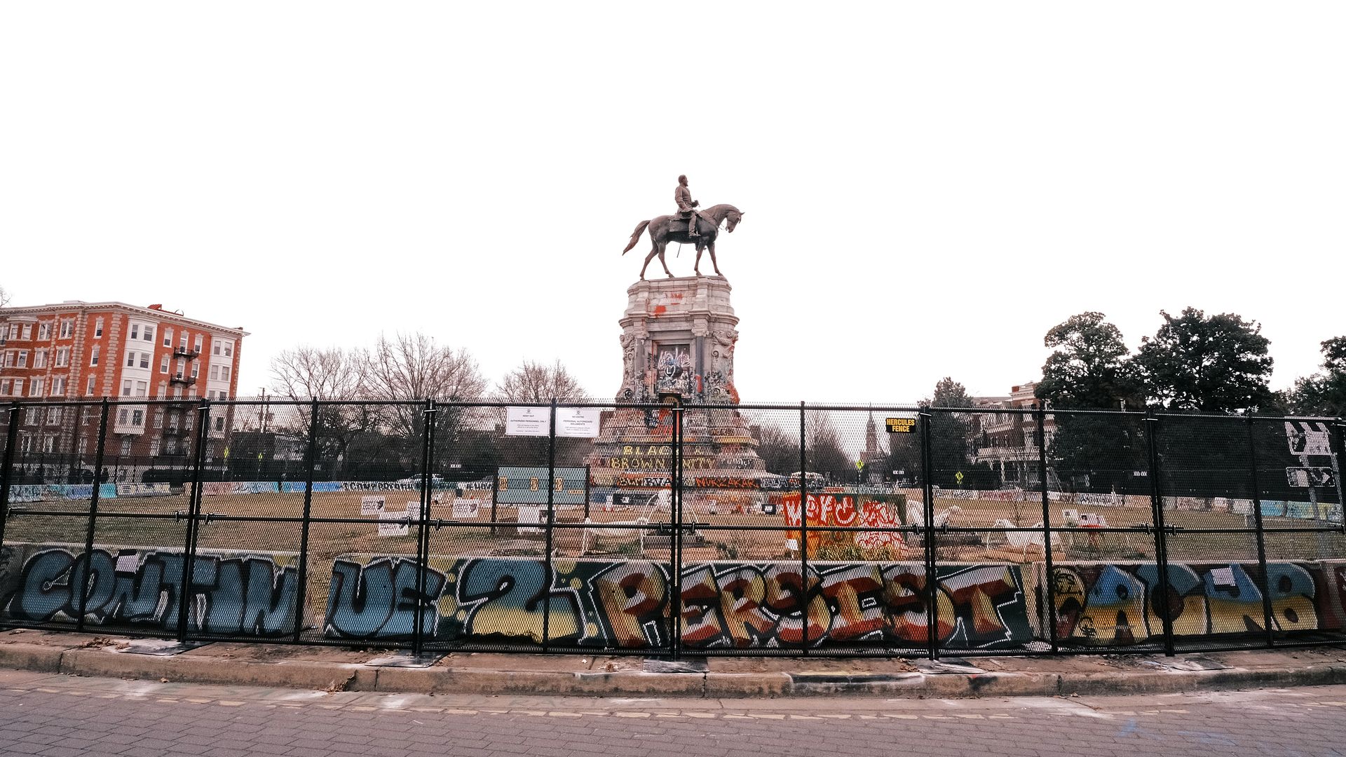 An 8-foot fence is erected around the Robert E. Lee monument on January 25, 2021 in Richmond, Virginia.