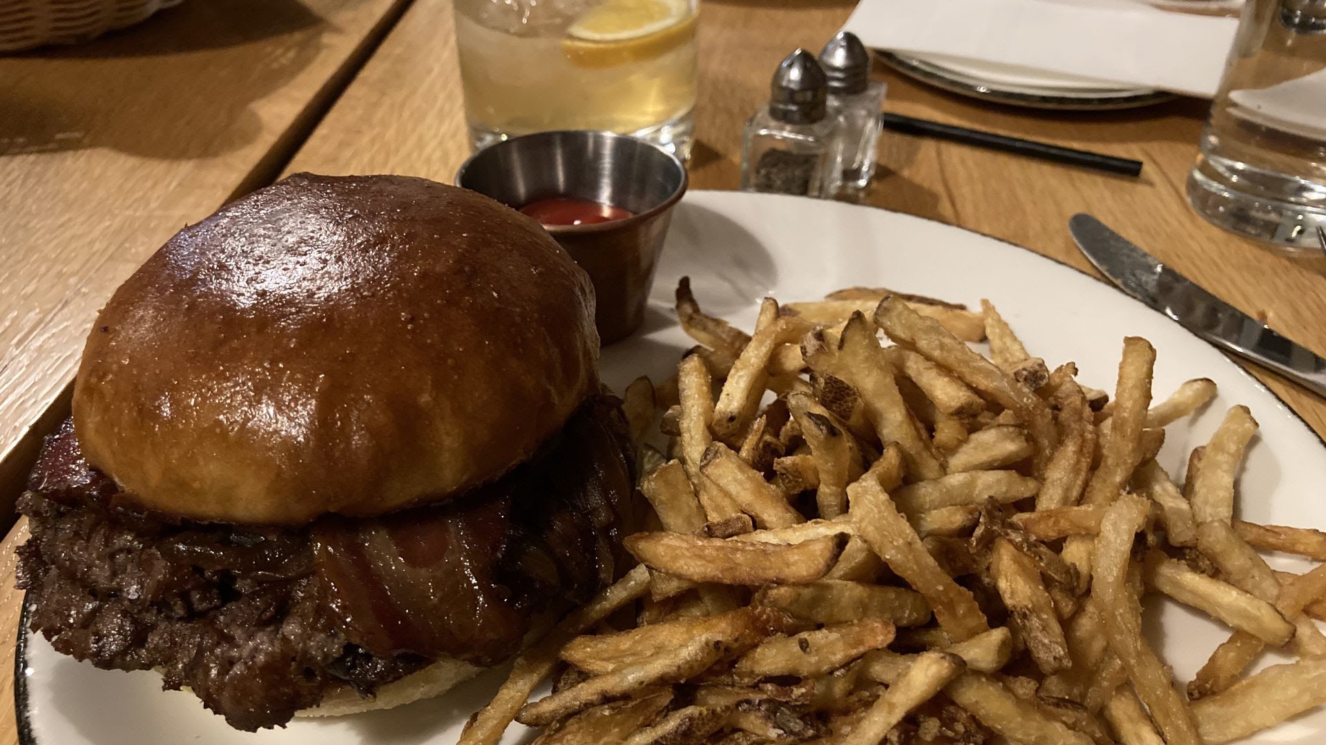 A photo of the A-Side Burger with fries at A-Side Public House in St. Paul.
