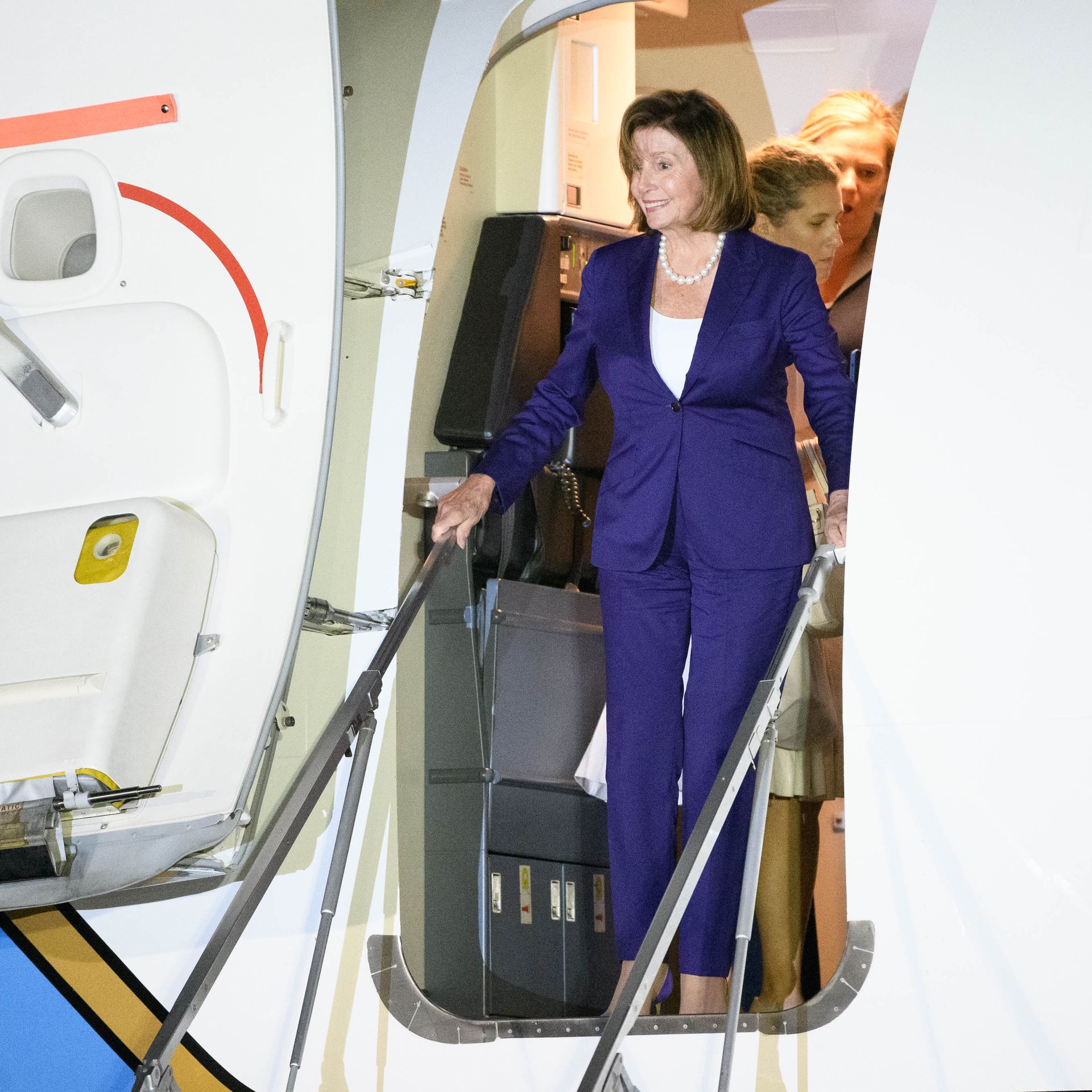 House Speaker Nancy Pelosi disembarking a plane in Fussa, Japan, on Aug. 4.