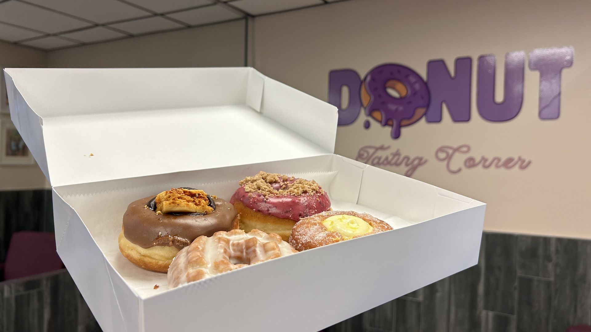 box of four doughnuts