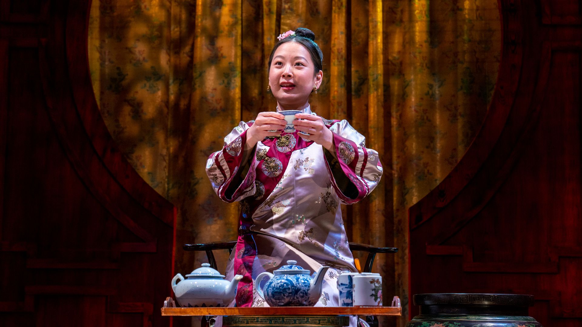 Girl holding tea cup