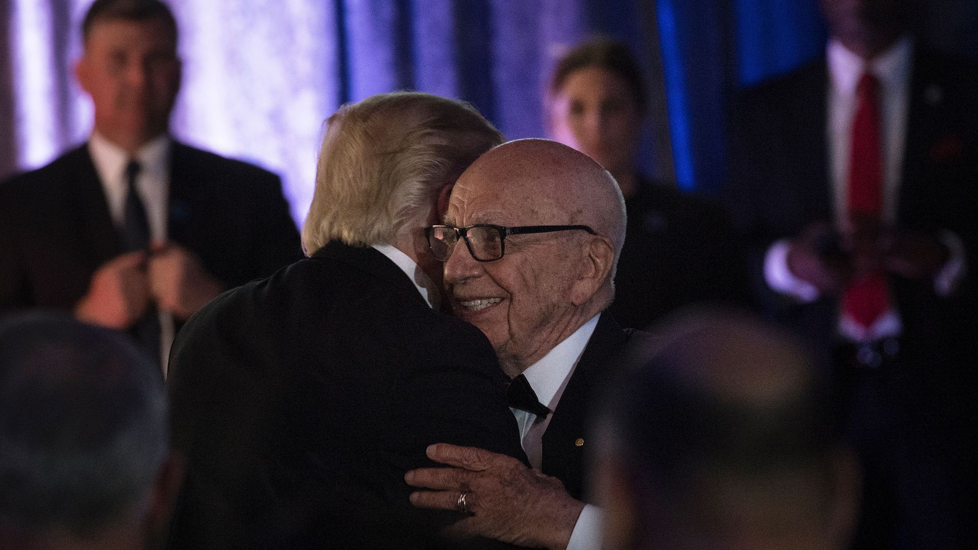President Trump embraces Rupert Murdoch