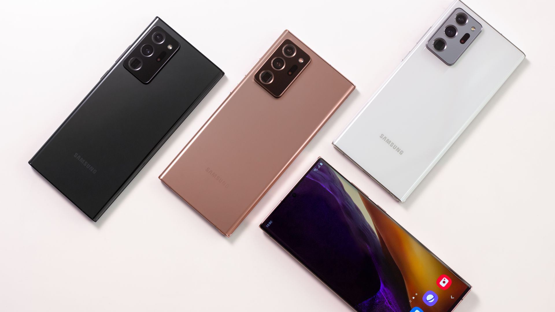 Four Galaxy Note Ultras, three with back side showing, one with the front screen