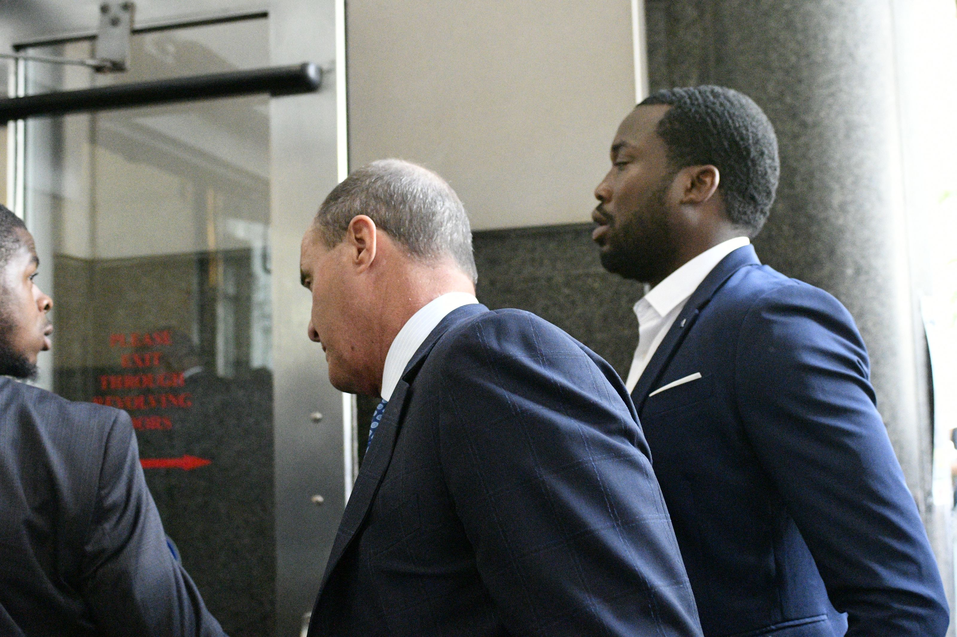Meek Mill arrives to court with attorney  Brian McMonagle for a hearing in August 2019.