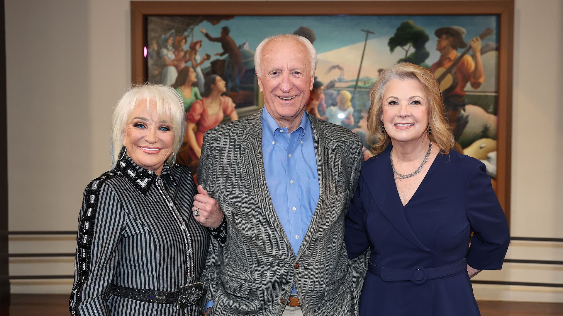 Tanya Tucker, Bob McDill and Patty Lovelesss pose at a press conference announcing the 2023 inductees at Country Music Hall of Fame and Museum