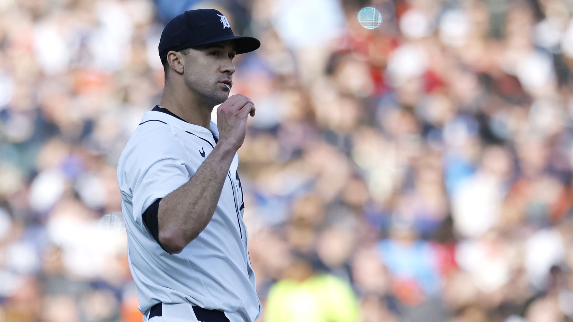A player is shown visibly chewing gum