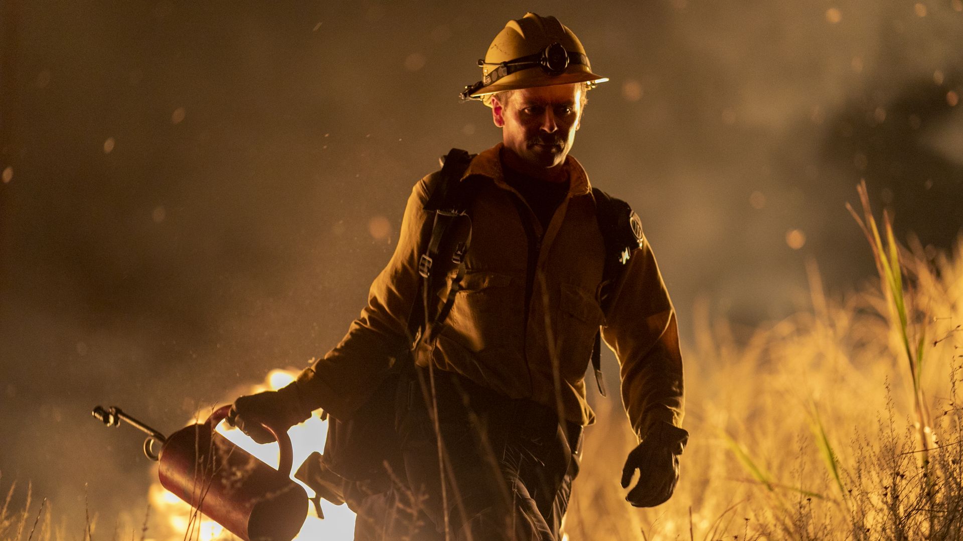 A firefighter using a drip torch near Somis, California