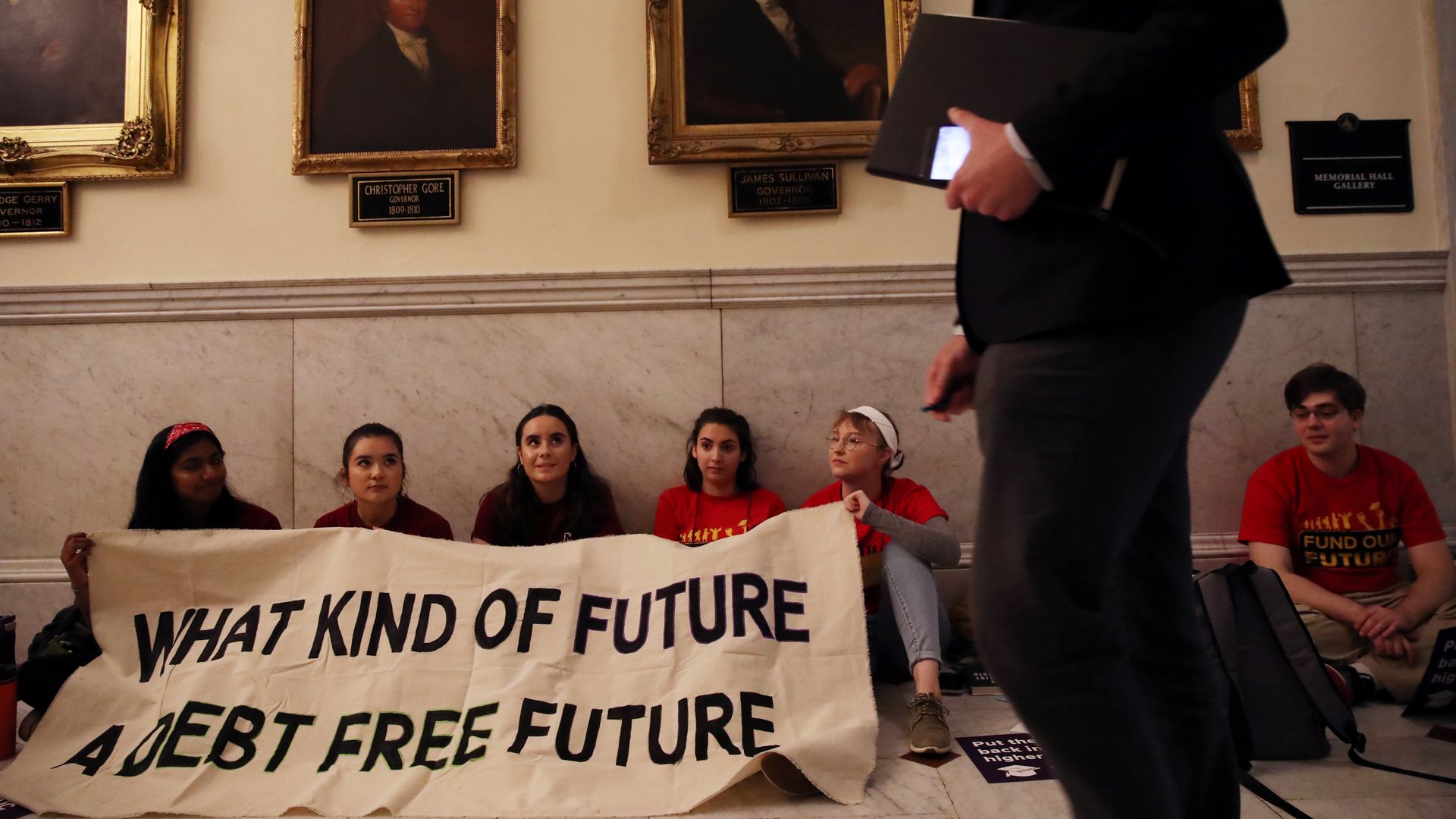 students sitting in at Massachusetts State House in Boston