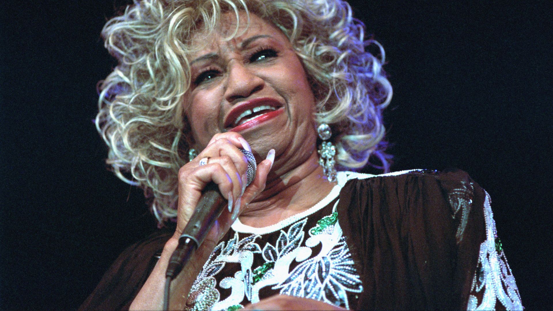Celia Cruz singing.