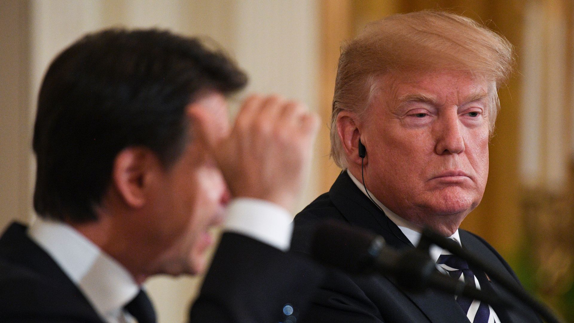President Trump listens during a joint press conference with Italian Prime Minister Giuseppe Conte in the East Room of the White House in Washington, DC, July 30, 2018. 