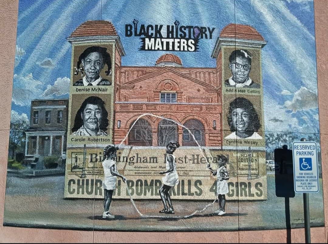 A mural depicting the 16th Street Baptist Church in Birmingham, Alabama, and the four girls who died in the 1963 bombing there. 