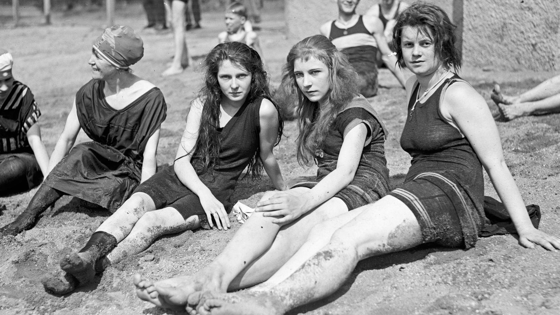 Young women or teen girls in swim suits on a bathing beach ca. between 1909 and 1932. 