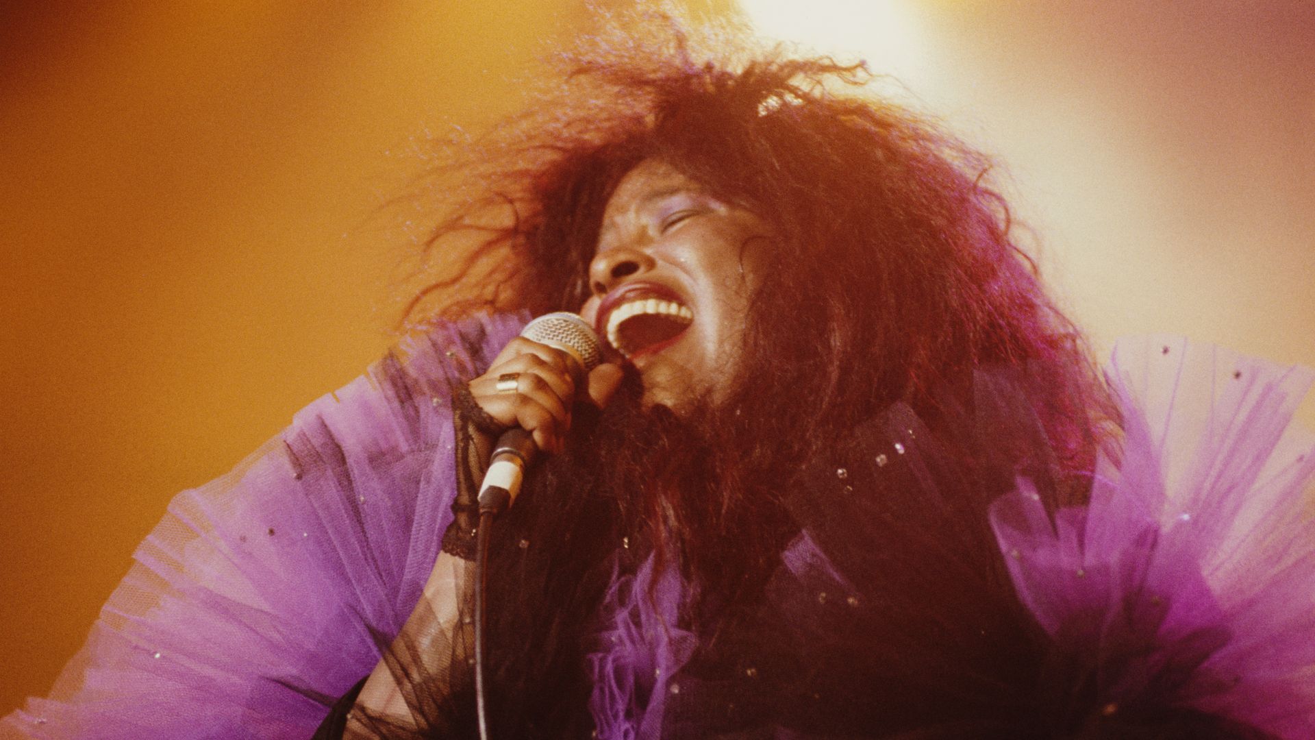 R&B legend Chaka Khan sings on stage.