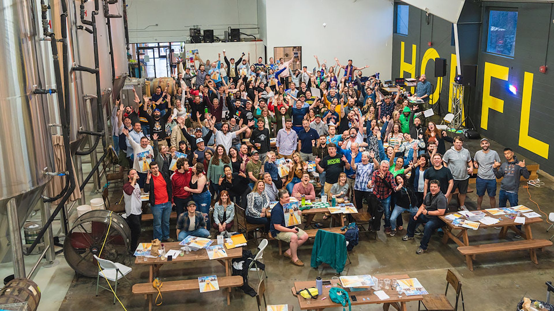 group of people at a brewery