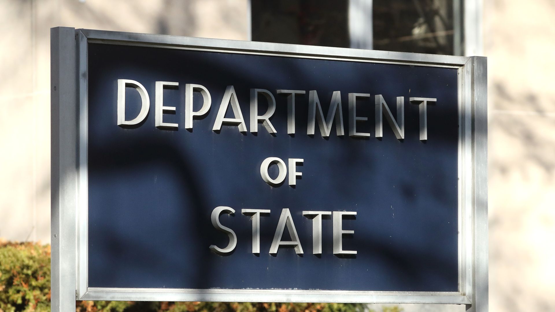 Image of the State Department sign outside the department's headquarters 