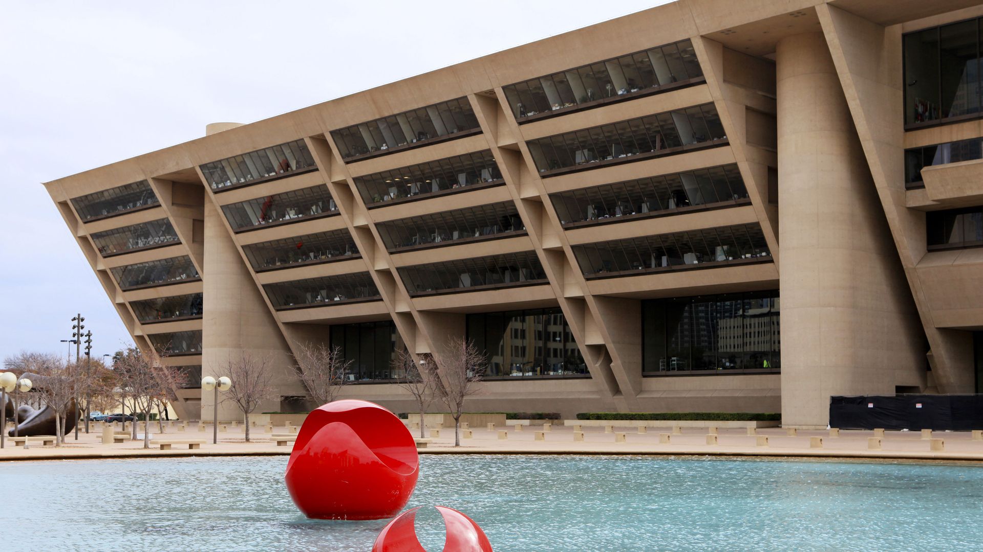 The plaza in front of Dallas City Hall, with the building in the background.