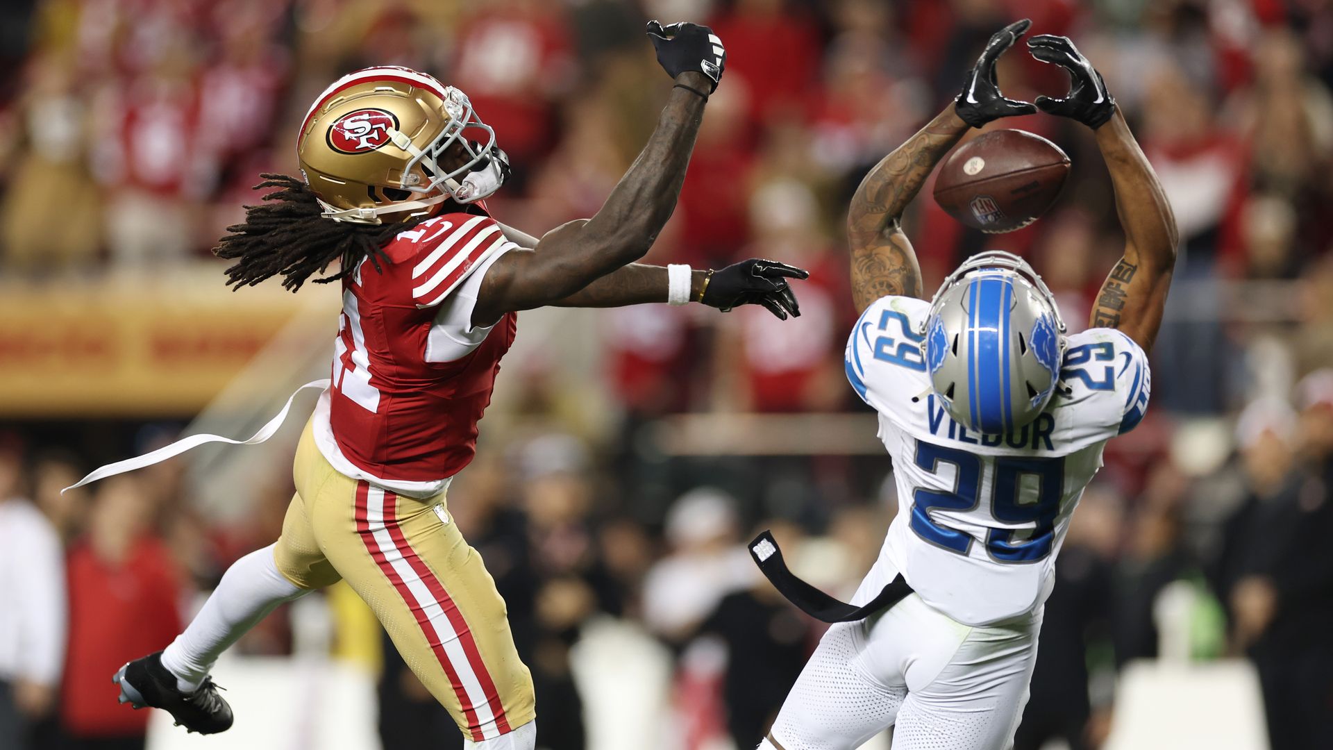 The Lions' Kindle Vildor attempts to intercept a pass intended for the 49ers' Brandon Aiyuk during the third quarter of Sunday's NFC Championship Game at Levi's Stadium in Santa Clara, Calif. 