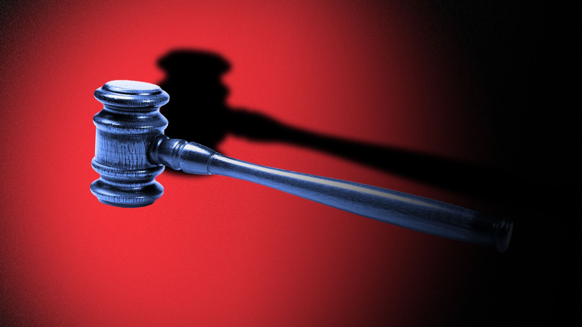 Gavel on red background
