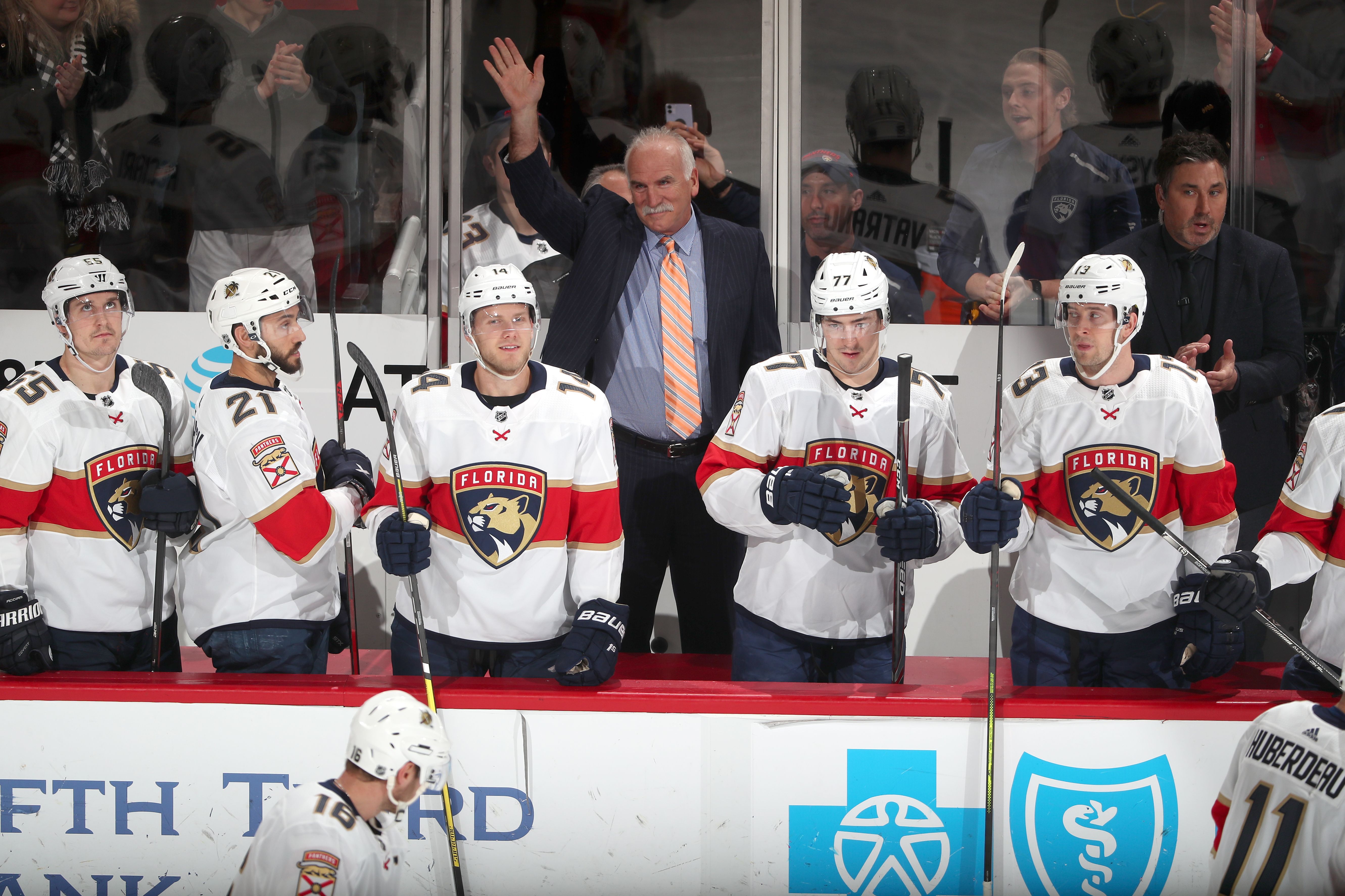 Joel Quenneville waves to the crowd
