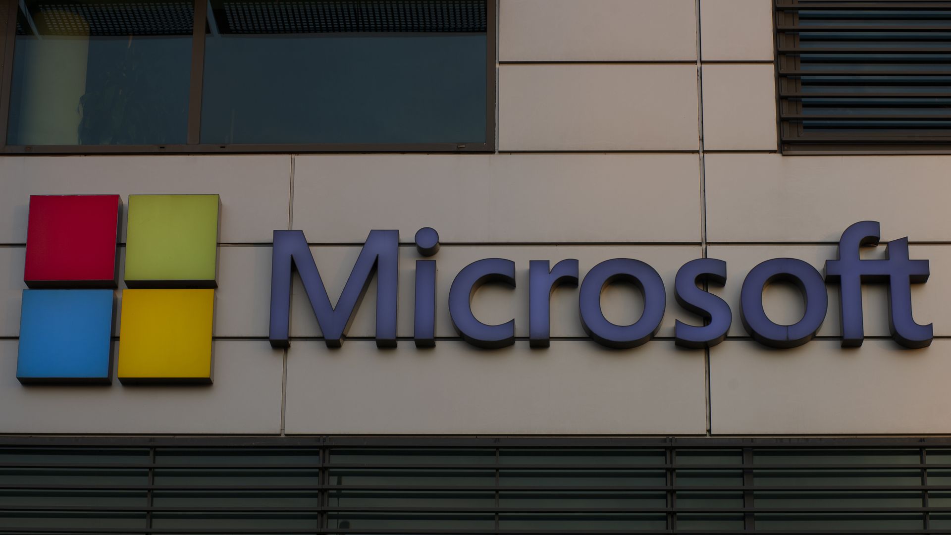 A photo of a Microsoft sign on an office building