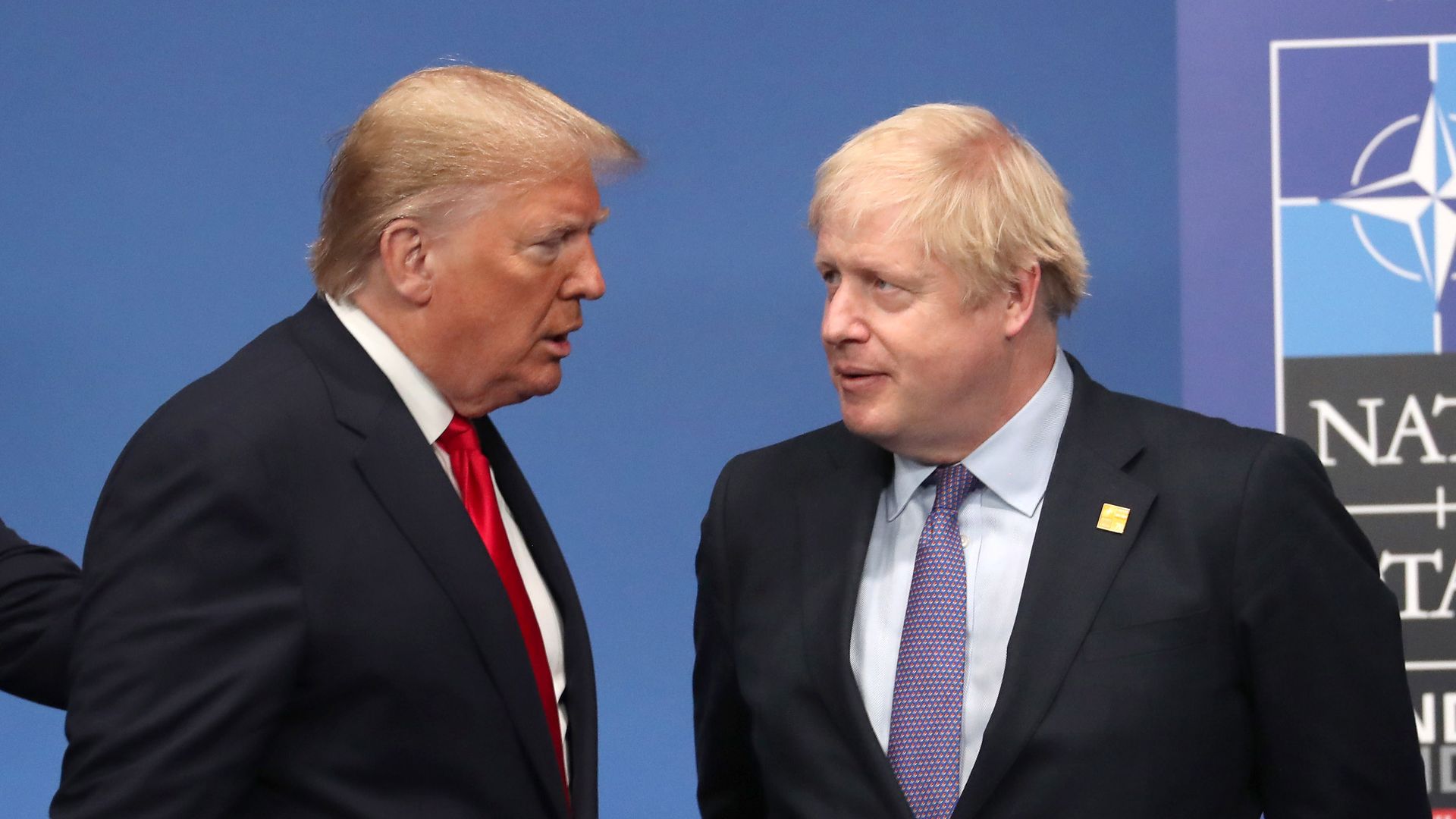 President Donald Trump and British Prime Minister Boris Johnson speak at this month's NATO meeting.
