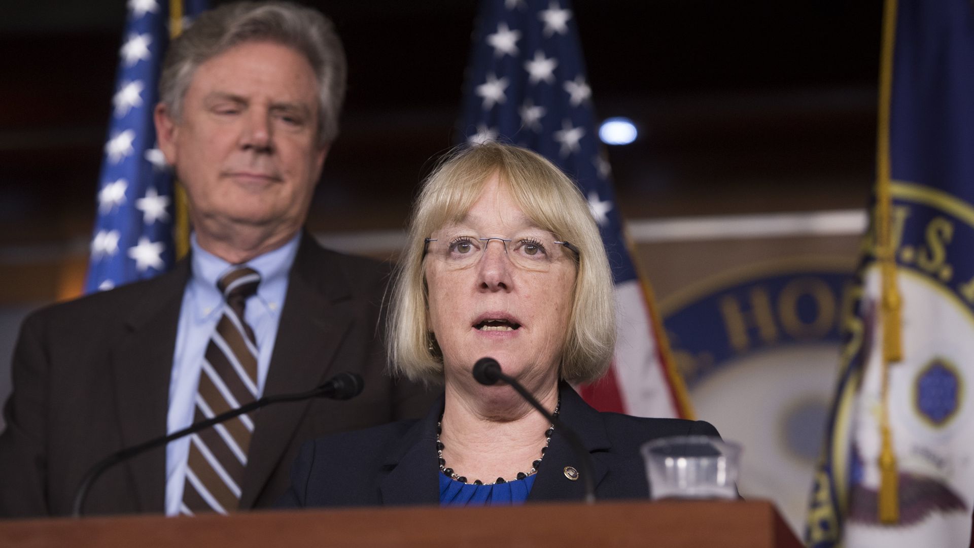 Photo of Patty Murray speaking from a podium with Frank Pallone standing behind her
