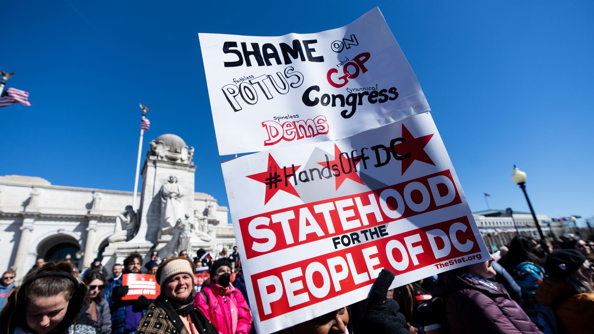 Statehood signs held by activists